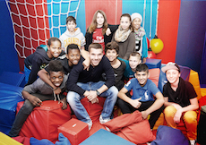Lukas Podolski plays with children - Lukas Podolski Stiftung
