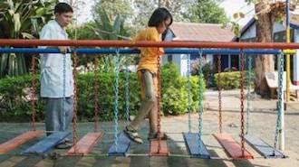 Kanhara from Cambodia trains at a wobbly bridge